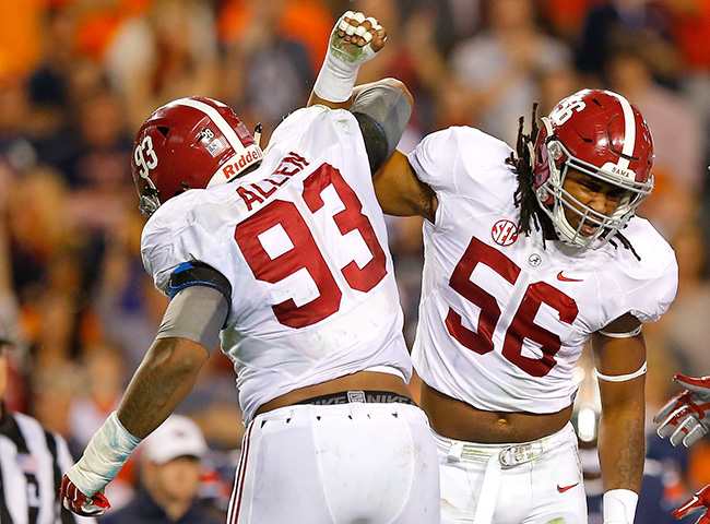 Alabama’s Jonathan Allen (93) and Tim Williams.